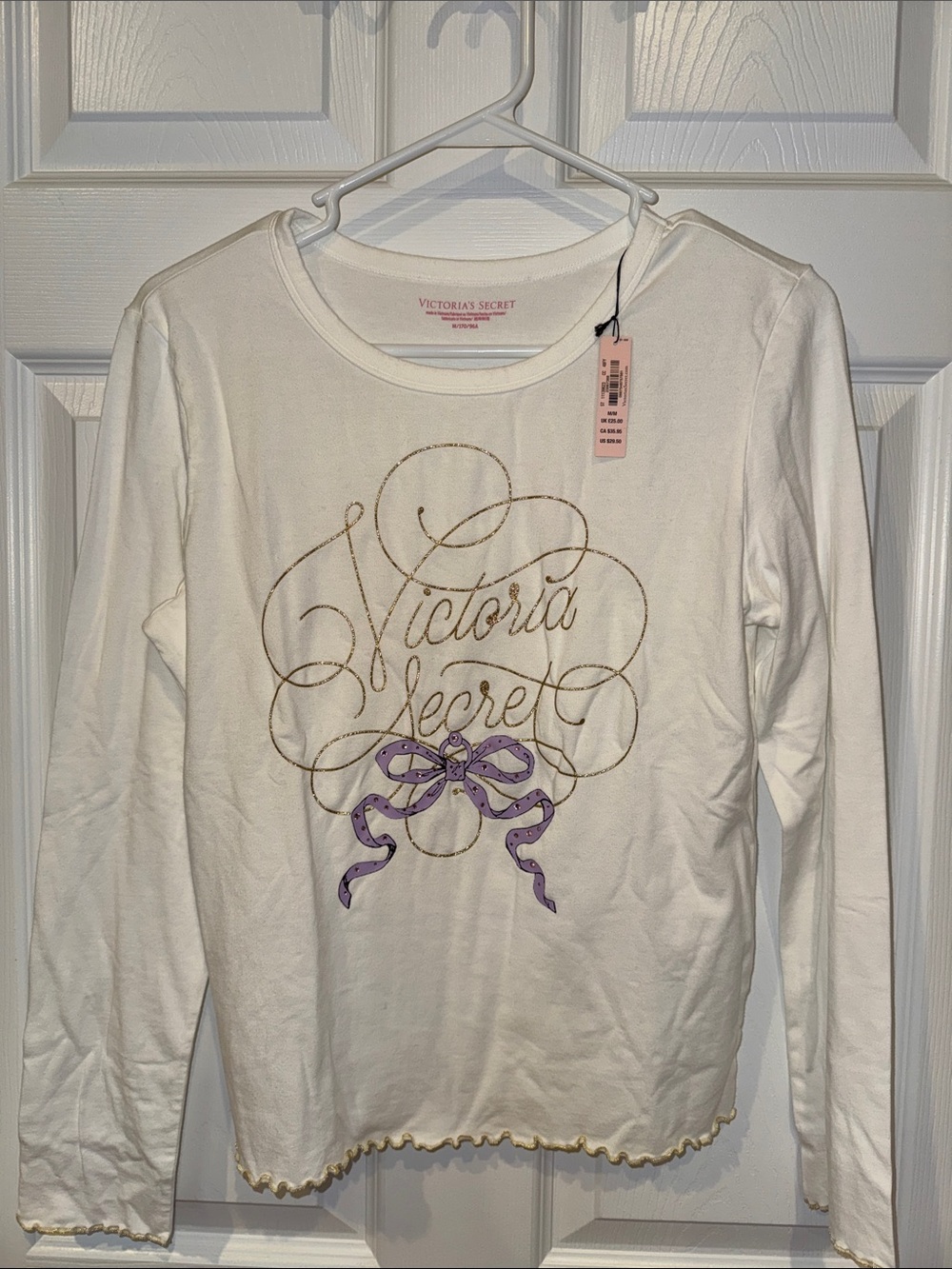 Victoria's Secret White Long Sleeve Top with Purple Bow and Gold Script